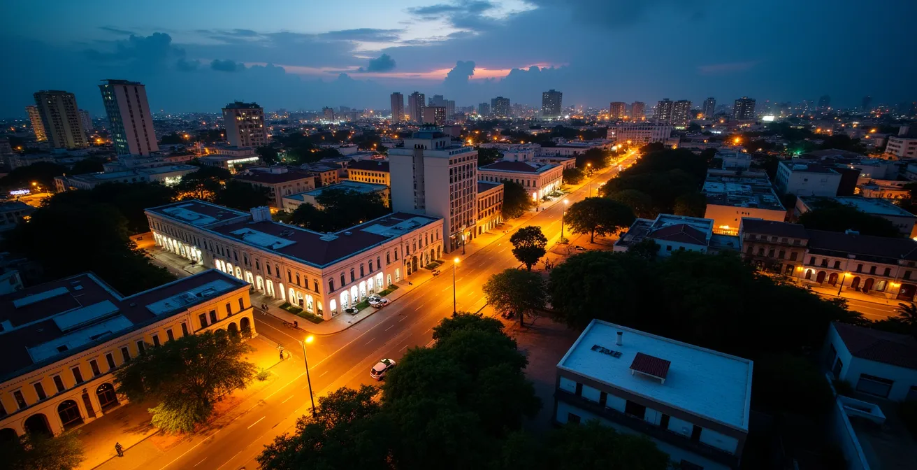 Vista aérea de Santo Domingo mostrando diferentes barrios con variaciones de iluminación indicando niveles de seguridad para turistas españoles